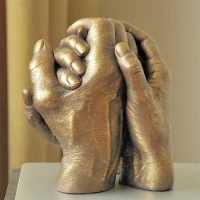 handbeeld in brons kleur geschilderd